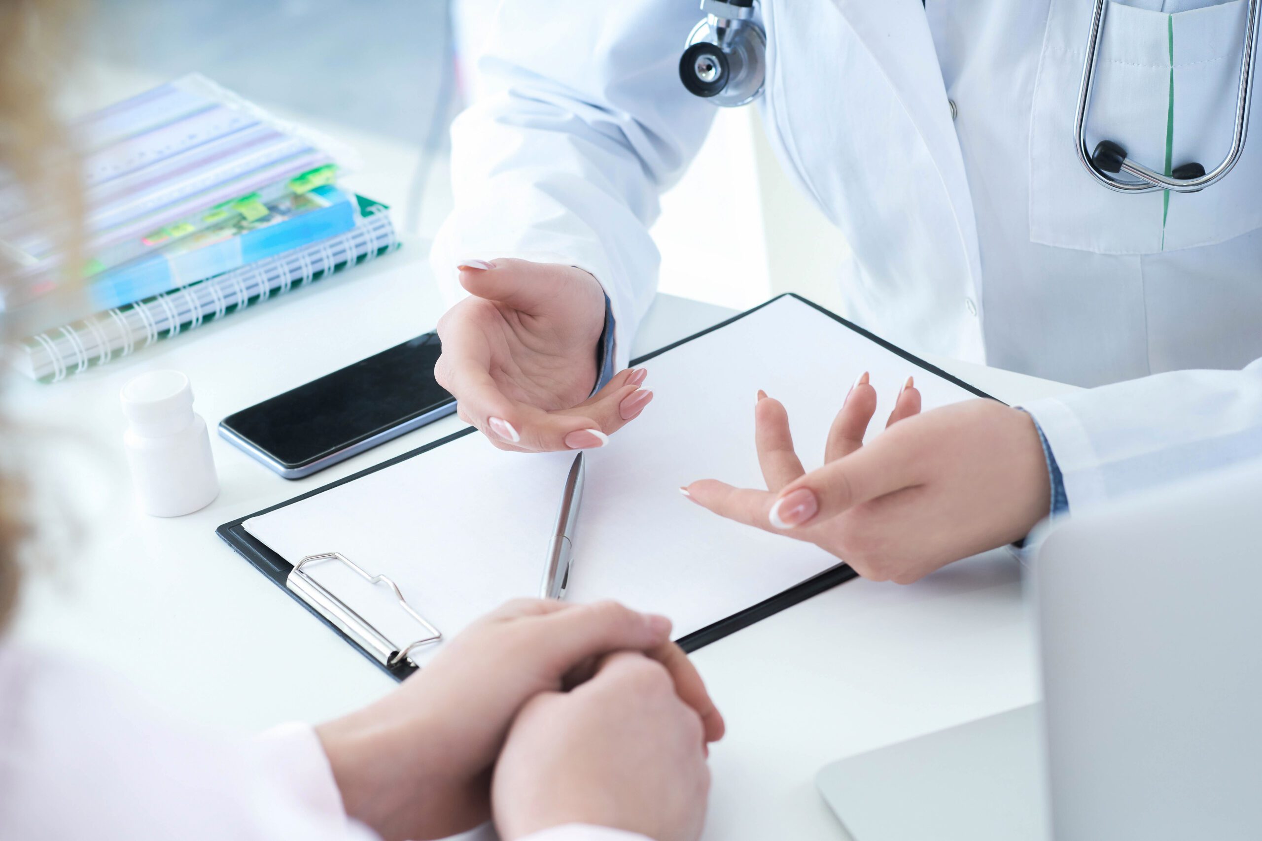 Patient,Listening,Intently,To,A,Female,Doctor,Explaining,Patient,Symptoms