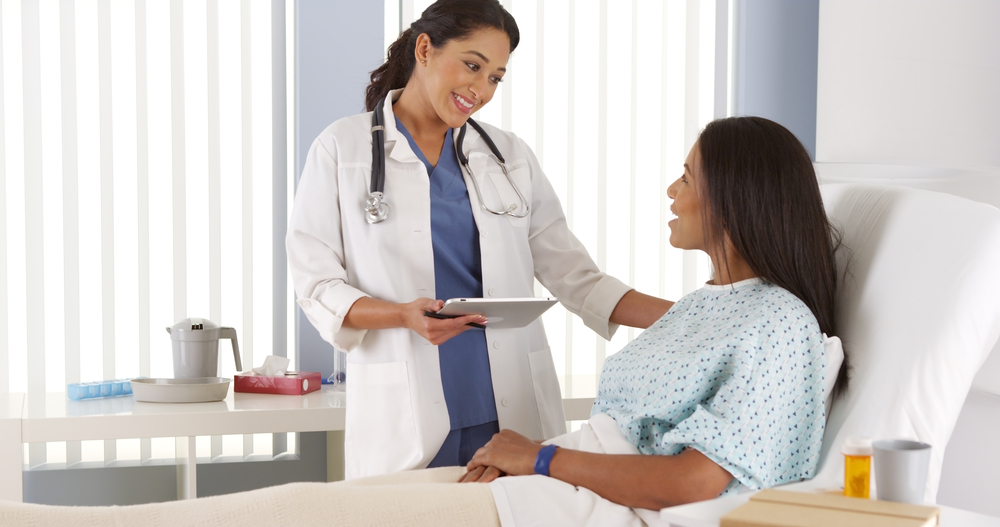 Doctor with patient after surgery.