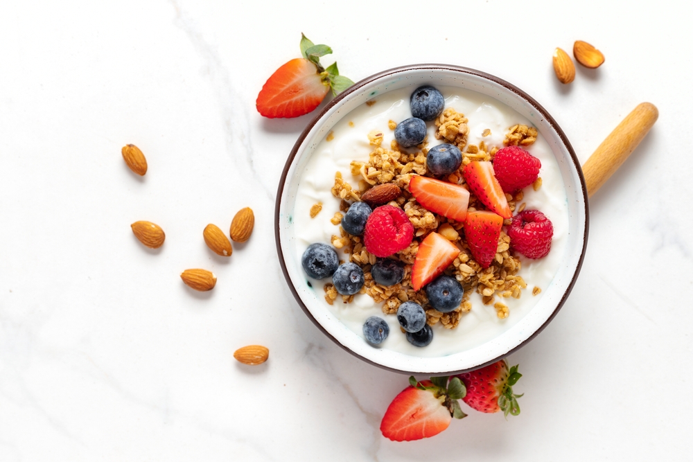 A yogurt parfait with berries and granola.